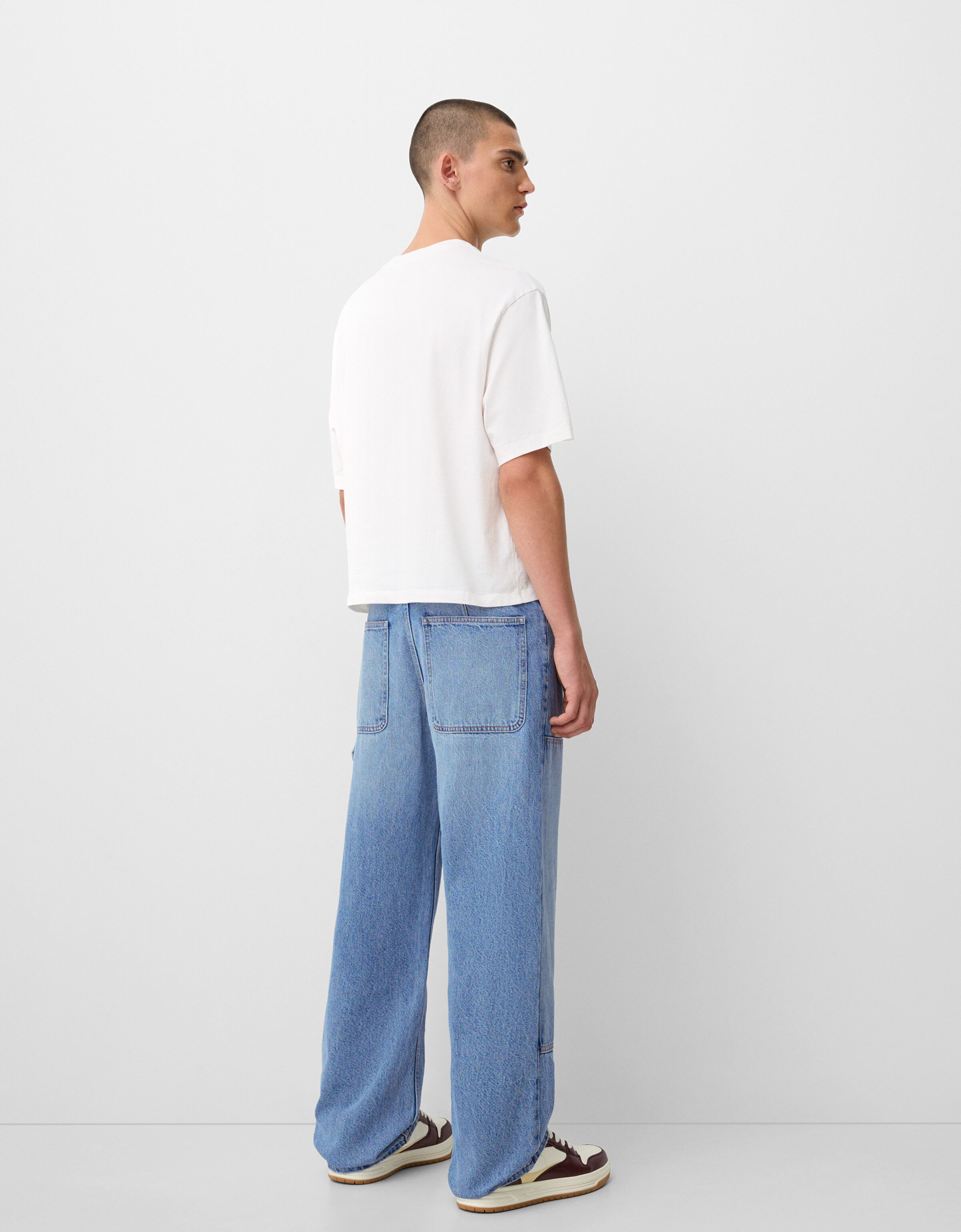 شلوار جین کارگری با جزئیات دوخت برند Bershka