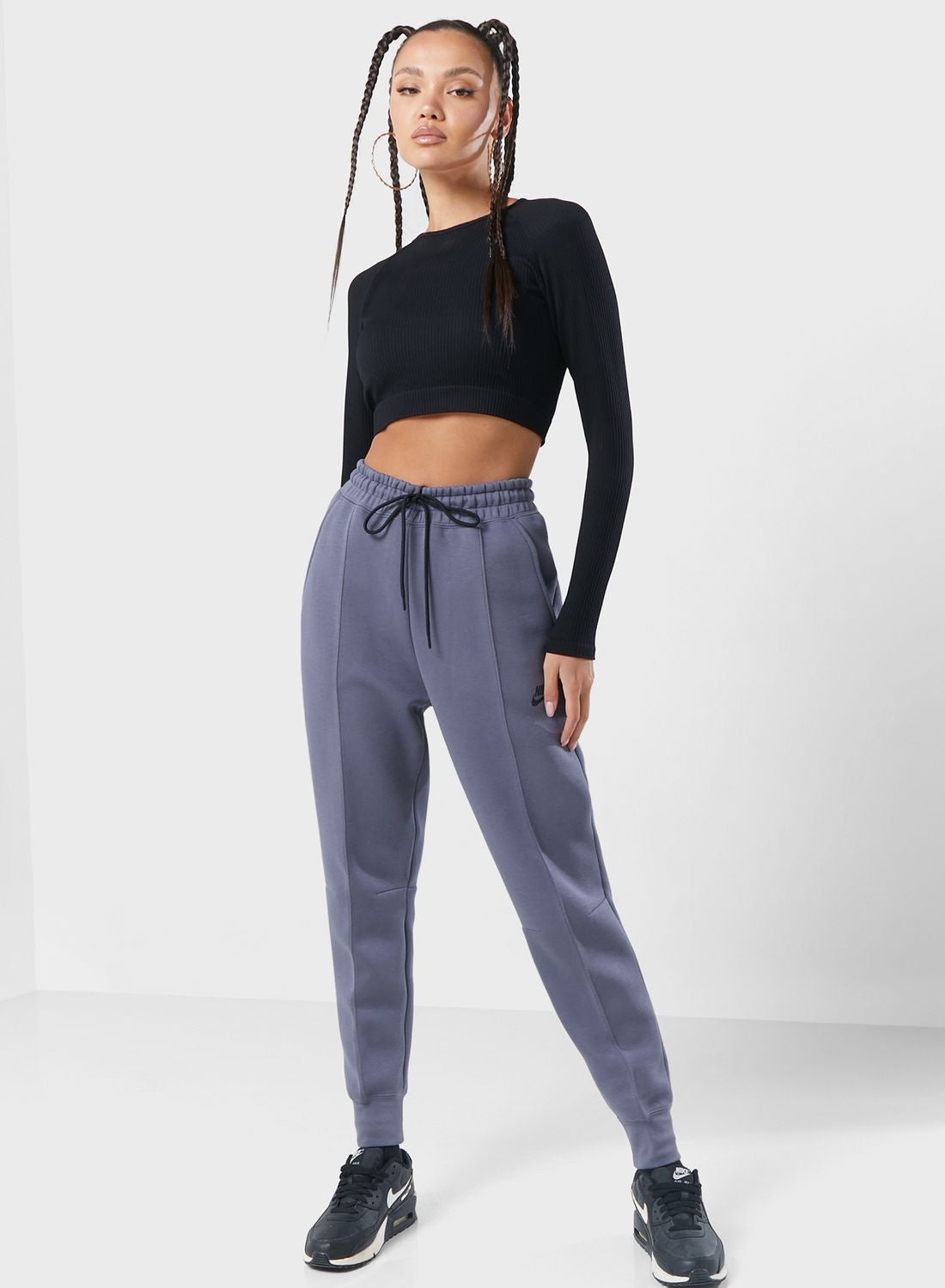 شلوار جین میدی زنانه برند NSW Tech Fleece برند Nike